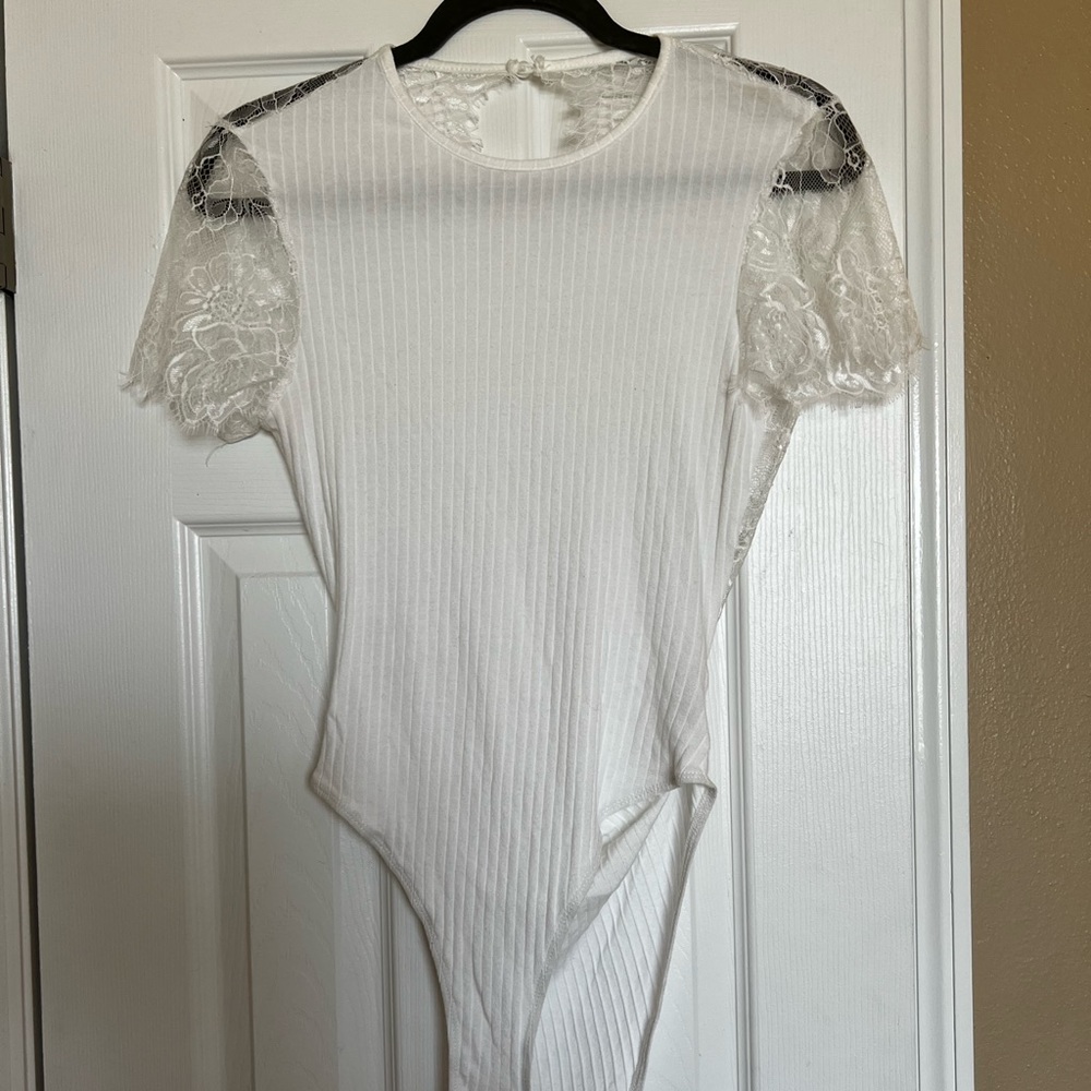 White lace sleeve/ backless bodysuit